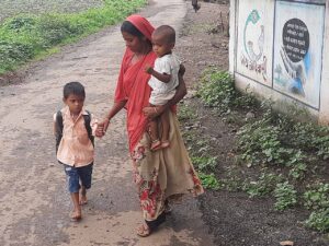 Woman taking kids to school